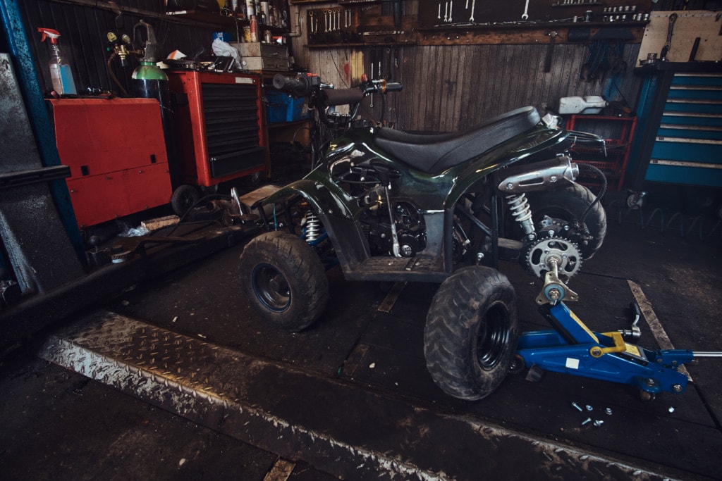 ATV repair in garage